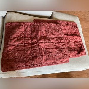 2 rust/dark orange standard pillow shams